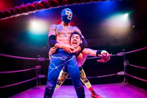 A wrestler in a tight headlock