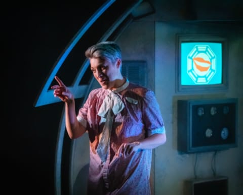 A woman in a dystopian chamber