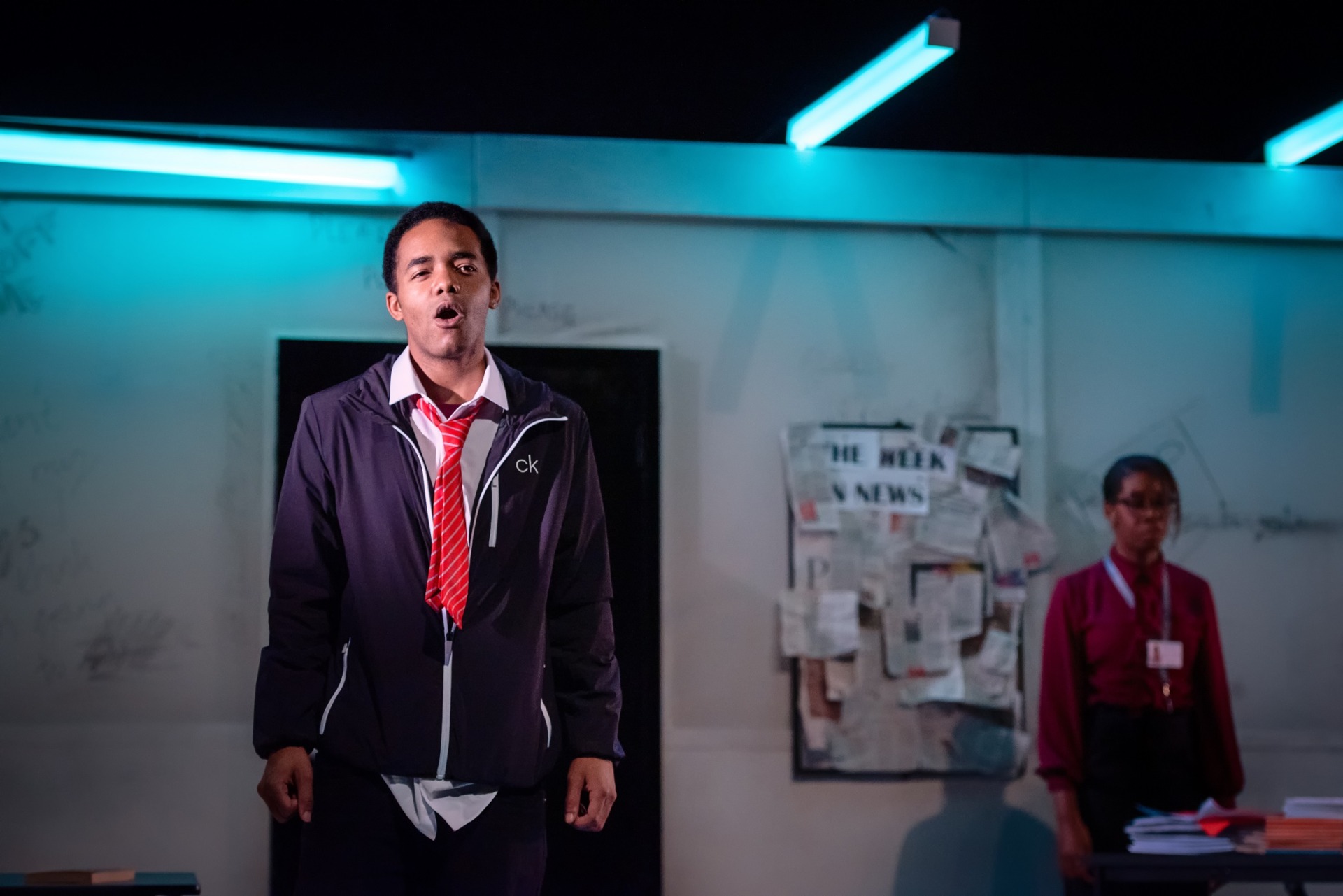 A teenage pupil recounting his story as his scared teacher listens behind