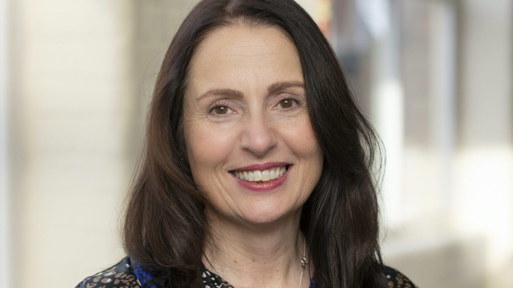 Co-Chair Fiona smiling in Sunny Bank Mills