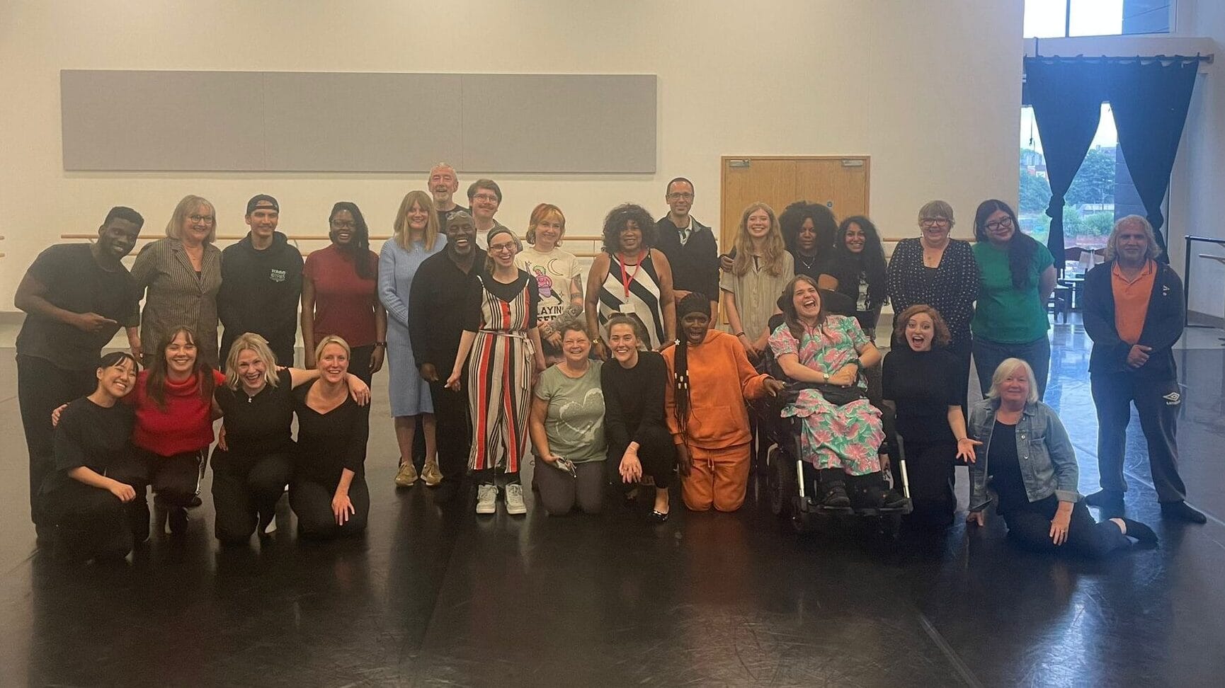 Our brilliant writers and directors and actors in a big smiley group