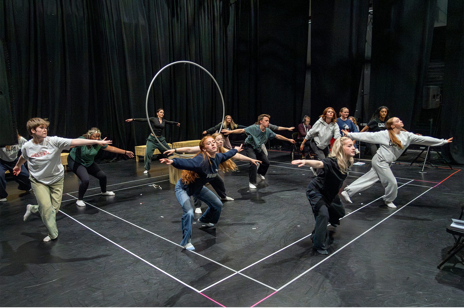 A group of students dancing on stage