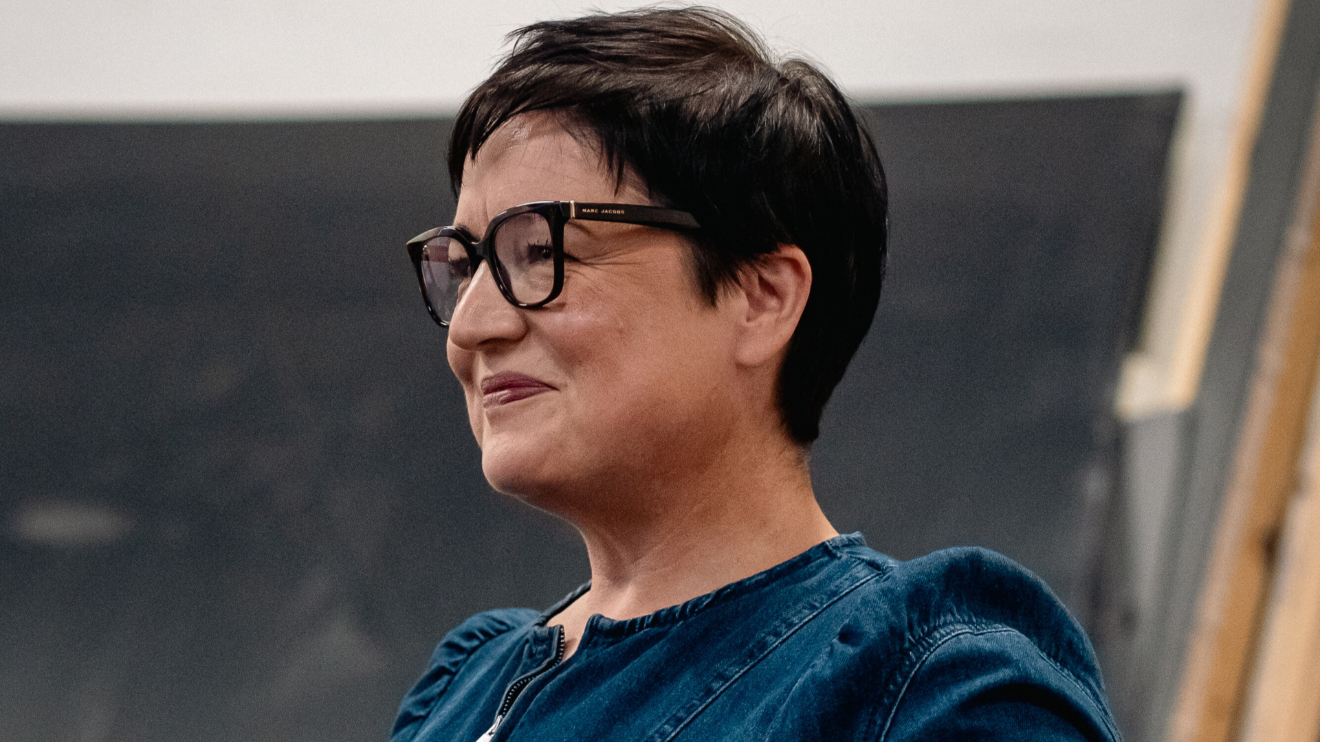 Ruth smiling in glasses