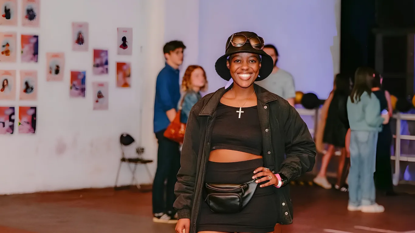 Linda-Ray stood smiling with her hand on hip