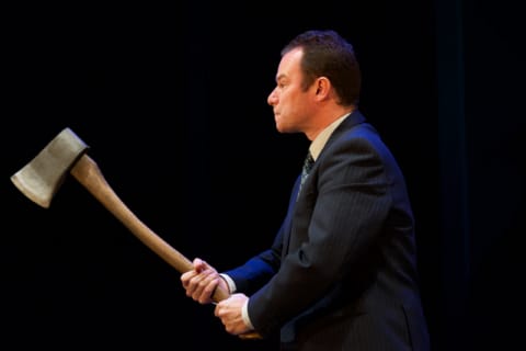 A man holding an axe.